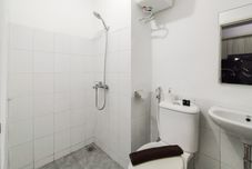 In-room Bathroom Homey Grey Studio at Grand Asia Afrika Apartment Bandung By Travelio
