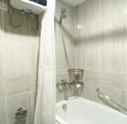 In-room Bathroom 2 Cozy Living Studio Apartment at Vasanta Innopark By Travelio