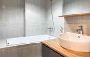 In-room Bathroom 2 Spacious and Homey Studio Vasanta Innopark Apartment By Travelio