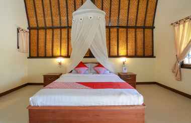 Kamar Tidur 2 OYO 93664 Homestay Purirano