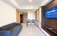 Common Space 4 Homey and Spacious 2BR with Extra Room at Meikarta Apartment By Travelio