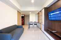 Common Space Homey and Spacious 2BR with Extra Room at Meikarta Apartment By Travelio