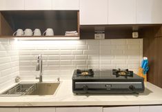 Lainnya 3 Homey and Spacious 2BR with Extra Room at Meikarta Apartment By Travelio