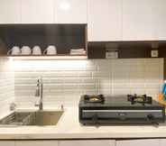 Others 3 Homey and Spacious 2BR with Extra Room at Meikarta Apartment By Travelio