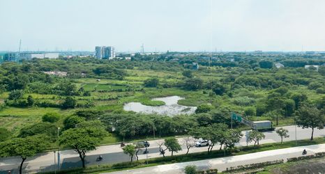 Bangunan 2 Homey and Spacious 2BR with Extra Room at Meikarta Apartment By Travelio