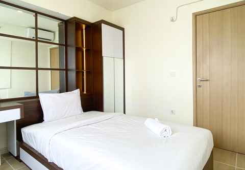 Bedroom Homey and Spacious 2BR with Extra Room at Meikarta Apartment By Travelio