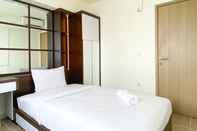 Kamar Tidur Homey and Spacious 2BR with Extra Room at Meikarta Apartment By Travelio