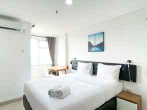 Kamar Tidur 4 Enjoy Living and Cozy Studio Enviro Apartment By Travelio