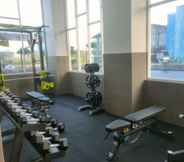 Fitness Center 5 Cozy Living and Strategic Studio Apartment at Suncity Residence By Travelio