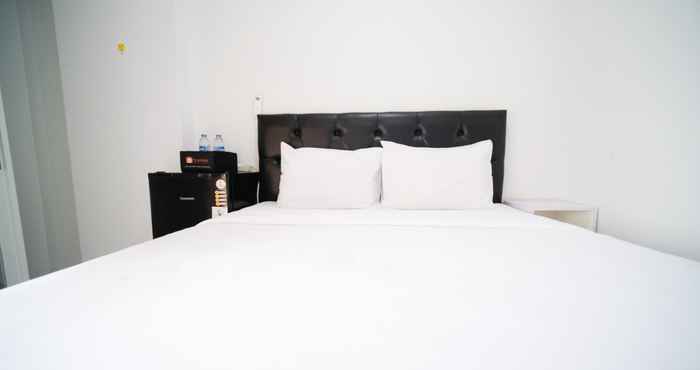 Bilik Tidur Cozy Living and Strategic Studio Apartment at Suncity Residence By Travelio