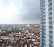 Bangunan 7 Cozy Living and Strategic Studio Apartment at Suncity Residence By Travelio