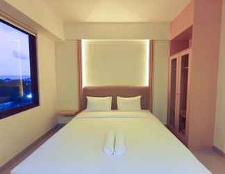 Bedroom 2 Minimalist Studio at Apartment Altuz Seturan Yogyakarta By Travelio