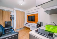 Khu vực công cộng 4 Warm and Comfortable 2BR at Tifolia Apartment By Travelio