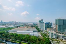 Sảnh chờ Warm and Comfortable 2BR at Tifolia Apartment By Travelio