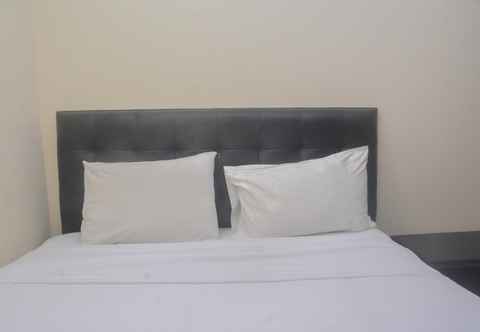 Bedroom Simply and Cozy 1BR at Kebagusan City Apartment By Travelio