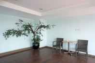 Lobby Vibrant and Restful 1BR Apartment at Belmont Residence Puri By Travelio