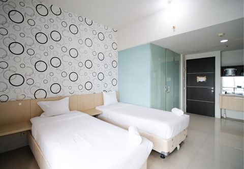 Bedroom Cozy and Clean Studio The Square Apartment By Travelio