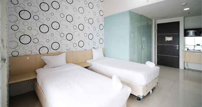 Bilik Tidur Cozy and Clean Studio The Square Apartment By Travelio