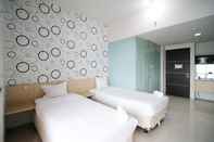 Bilik Tidur Cozy and Clean Studio The Square Apartment By Travelio