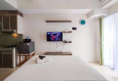 Bedroom 3 Nice and Strategic Studio at Tamansari Panoramic By Travelio