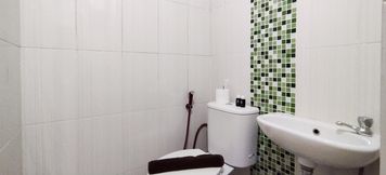 In-room Bathroom 5 Nice and Strategic Studio at Tamansari Panoramic By Travelio