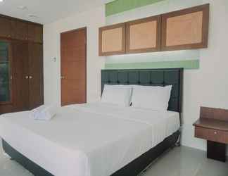 Kamar Tidur 2 Homey and Spacious 2BR Mangga Dua Apartment By Travelio