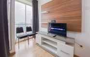 Common Space 6 Enjoy Living and Cozy 2BR Tifolia Apartment By Travelio