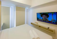Bedroom 2 Simply Look and Minimalist Studio Tokyo Riverside PIK 2 Apartment By Travelio