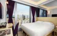 Bedroom 6 Starphire Hotel