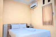 Bedroom Wisma Mutiara Mitra RedDoorz