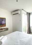 Others Enjoy Living and Homey Studio at Enviro Apartment By Travelio