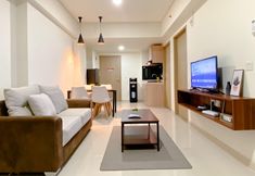 Others 7 Homey and Tidy 2BR with Work Space at Meikarta Apartment By Travelio