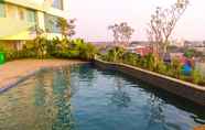 Kolam Renang 7 Stunning 1BR at Apartment Grand Kamala Lagoon By Travelio