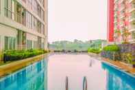 Swimming Pool Homey Best Studio at Taman Melati Margonda Apartment By Travelio