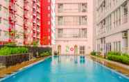 Swimming Pool 6 Homey Best Studio at Taman Melati Margonda Apartment By Travelio