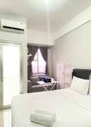 BEDROOM Warm and Homey Studio Transpark Juanda Bekasi Timur Apartment By Travelio