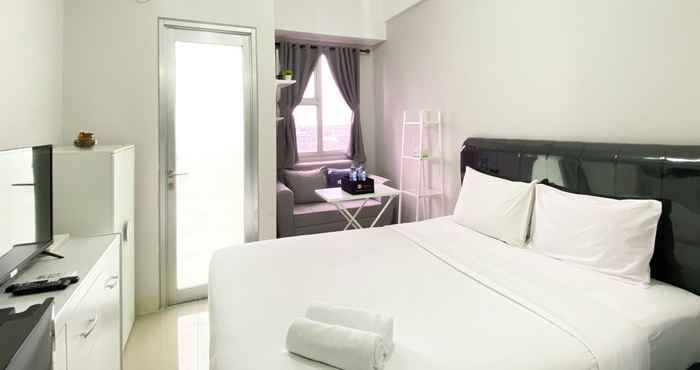 Bedroom Warm and Homey Studio Transpark Juanda Bekasi Timur Apartment By Travelio