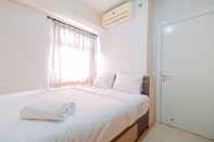 Others Homey and Modern 2BR at Green Pramuka City Apartment By Travelio