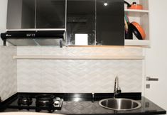 Others 3 Living Comfort 3BR at Springlake Summarecon Bekasi Apartment By Travelio