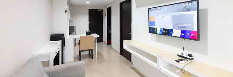 Lobby Cozy and Minimalist 1BR at Patraland Amarta Apartment By Travelio