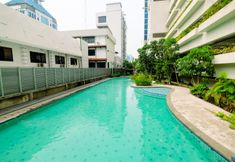 Swimming Pool 7 Best Location 2BR at Capitol Park Residence Apartment By Travelio
