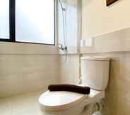 In-room Bathroom 2 Modern Look 2BR at Apartment Meikarta By Travelio