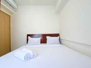 Kamar Tidur 4 Modern Look 2BR at Apartment Meikarta By Travelio