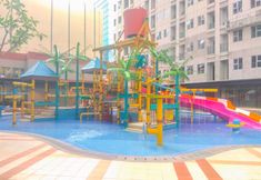 Swimming Pool 4 Modern Look and Cozy Studio Transpark Juanda Bekasi Timur Apartment By Travelio