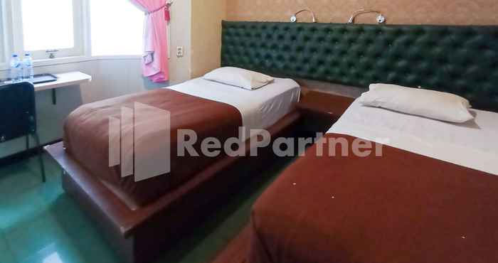 Phòng ngủ Nillo Hotel Kebumen Mitra RedDoorz