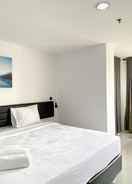 Others Good and Comfy Studio with Twin Bed at Enviro Apartment By Travelio