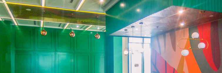 Lobby Classic and Minimalist Studio at Evenciio Margonda Apartment By Travelio