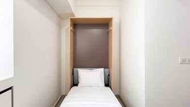 Bedroom Warm and Good Studio (No KItchen) Bandaraya - Tallasa City Makassar Apartment By Travelio