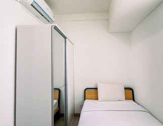 Bedroom 2 Cozy 1BR (No Kitchen) at Apartment Bandaraya - Tallasa City Makassar By Travelio