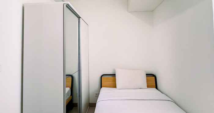 Bedroom Cozy 1BR (No Kitchen) at Apartment Bandaraya - Tallasa City Makassar By Travelio